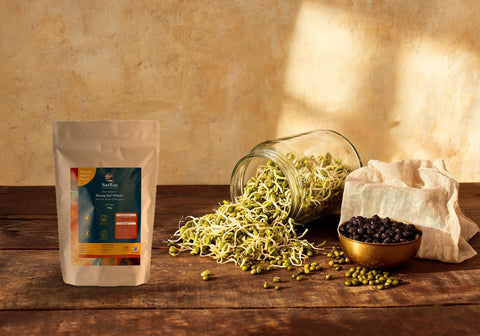 SatRas Desi Summer Moong Dal pouch beside a glass jar of freshly sprouted green moong and a brass bowl of black chana